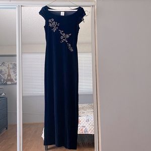 Long formal bluish black velvety gown ready for a night out